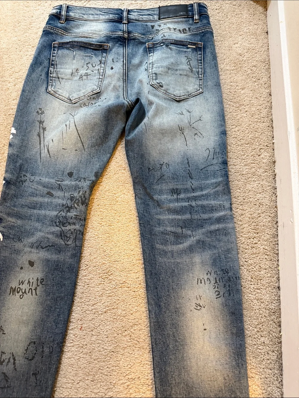 AMIRI Distressed Blue Graphic Skinny Jeans